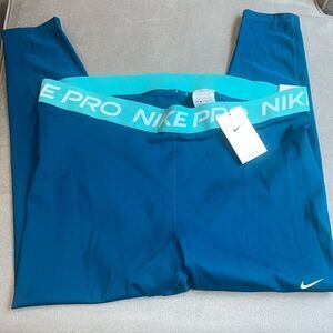 NWT Nike Pro dry fit pants in a teal color